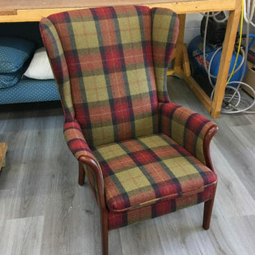 Parker knoll chair in a tartan fabric